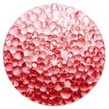 Voroses, attetsző vizcseppekkel teli felulet gomb alakban.